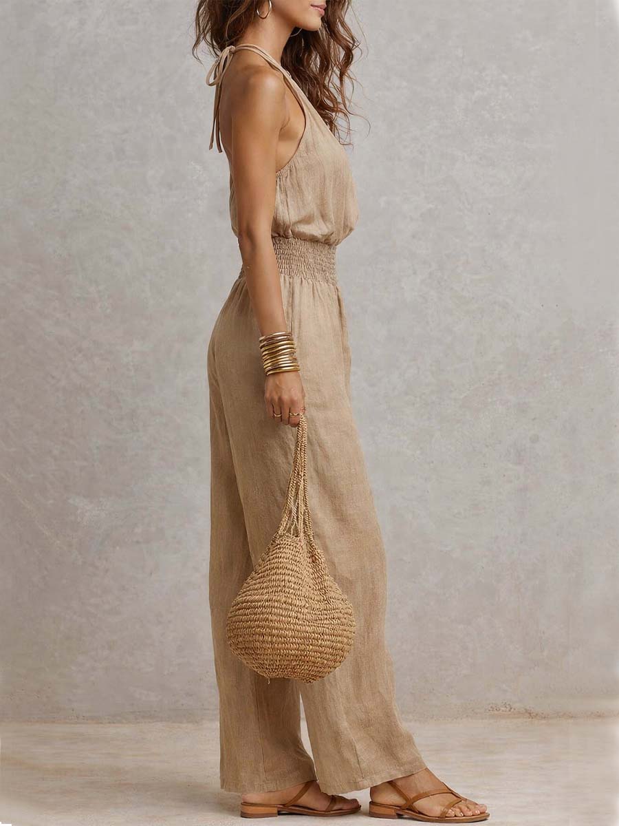 Mono de cuello halter de algodón y lino con cintura fruncida y pierna ancha