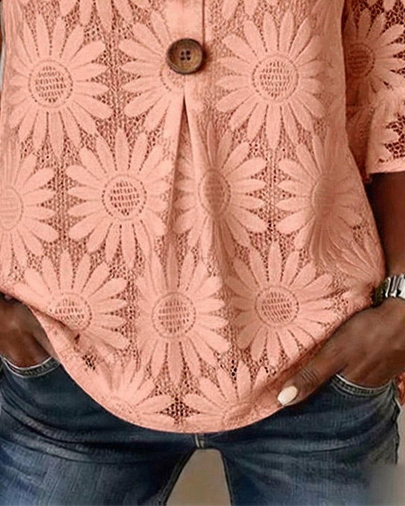 Blusa con estampado de margaritas y volantes