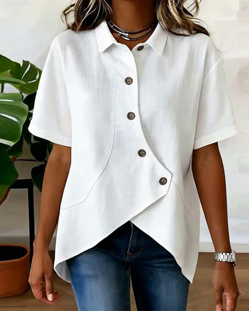 Blusa asimétrica de algodón y lino con botones