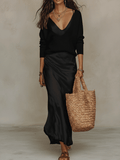 Conjunto elegante de jersey de punto y falda midi de satén negra