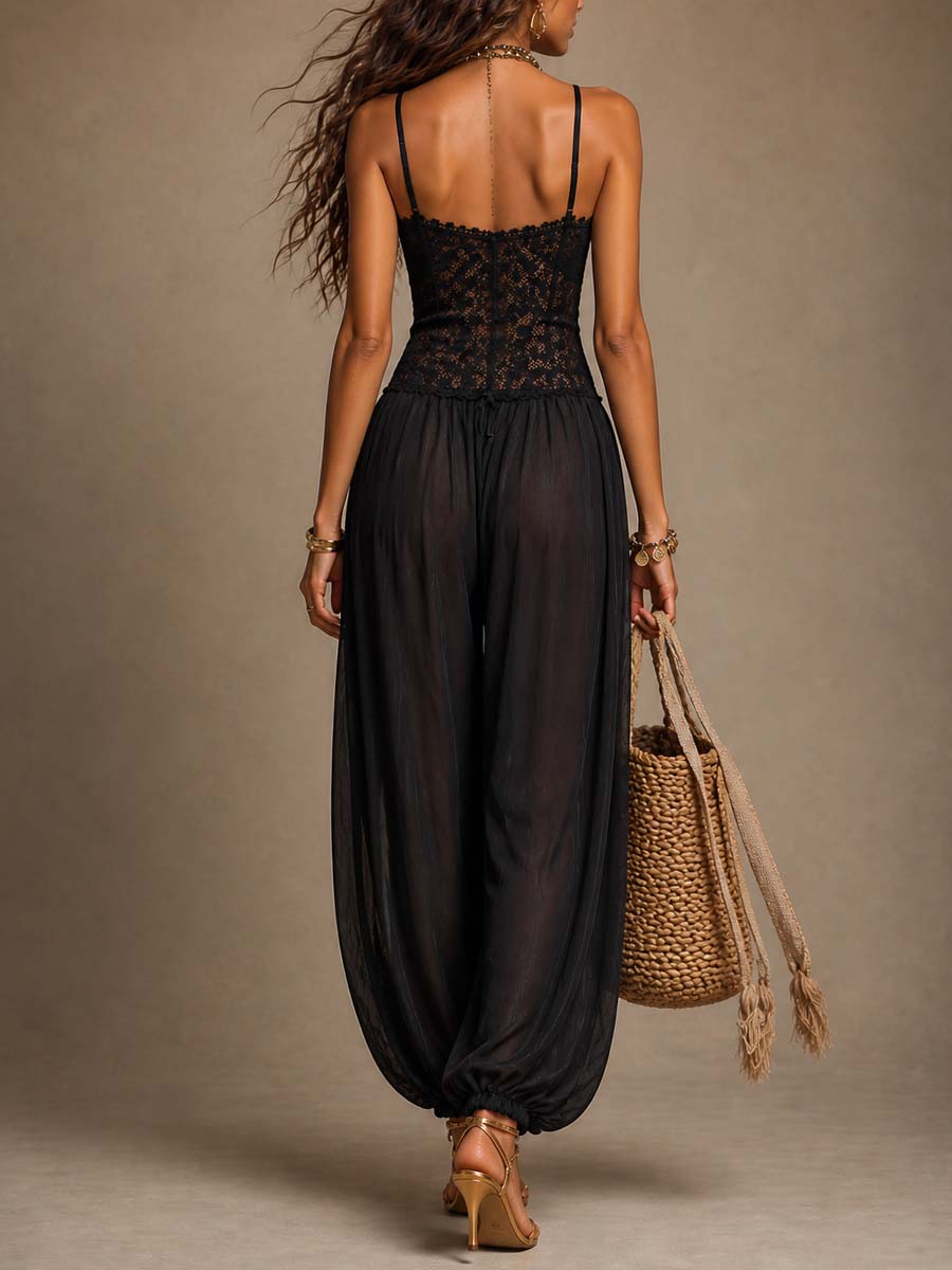 Mono harem de cuello halter en chiffon negro con encaje
