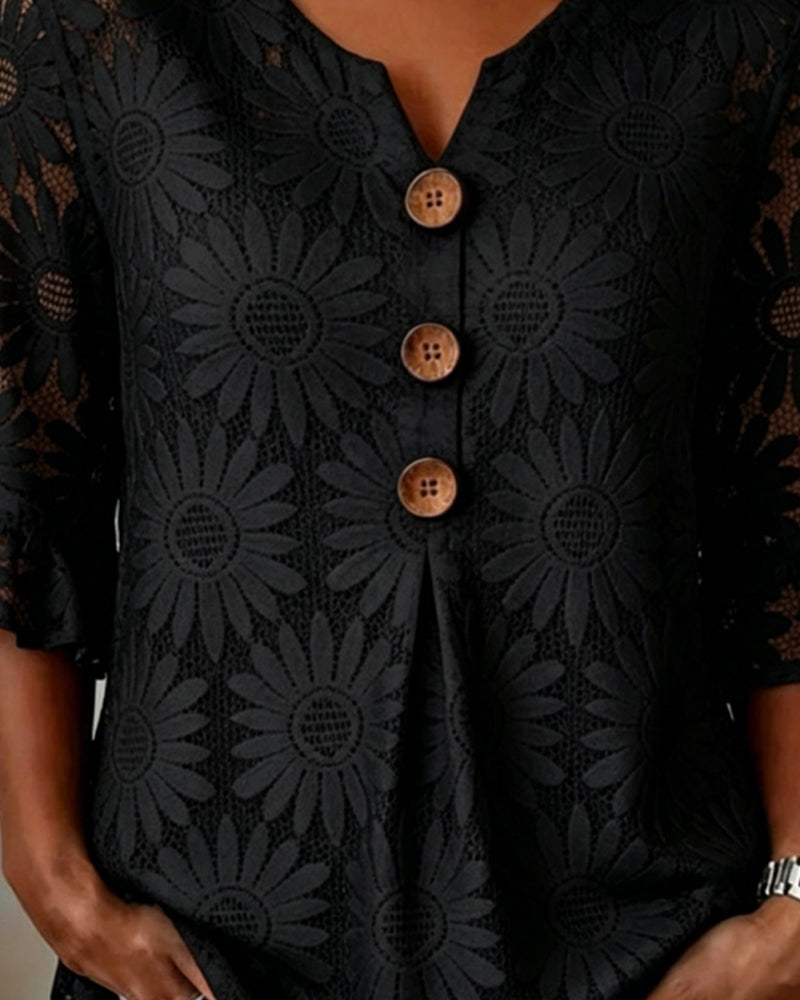 Blusa con estampado de margaritas y volantes