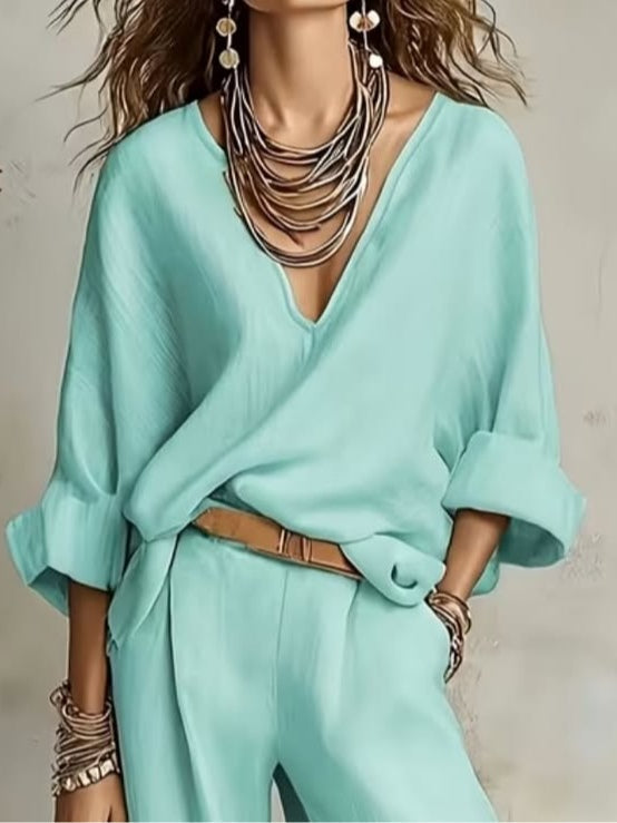 Conjunto de top con escote en pico y pantalón con cinturón