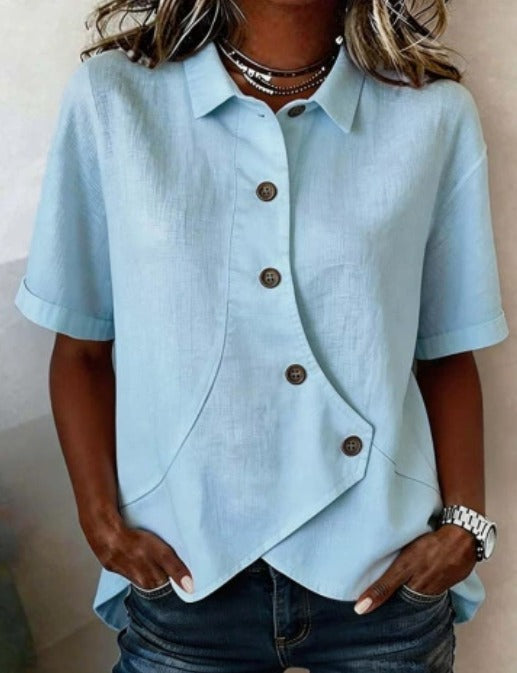 Blusa asimétrica de algodón y lino con botones