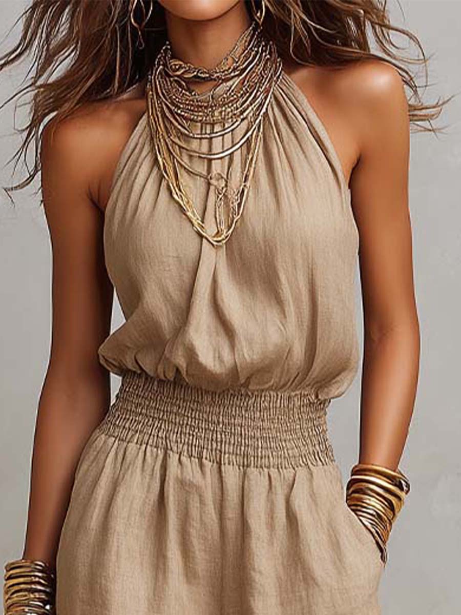 Mono de cuello halter de algodón y lino con cintura fruncida y pierna ancha