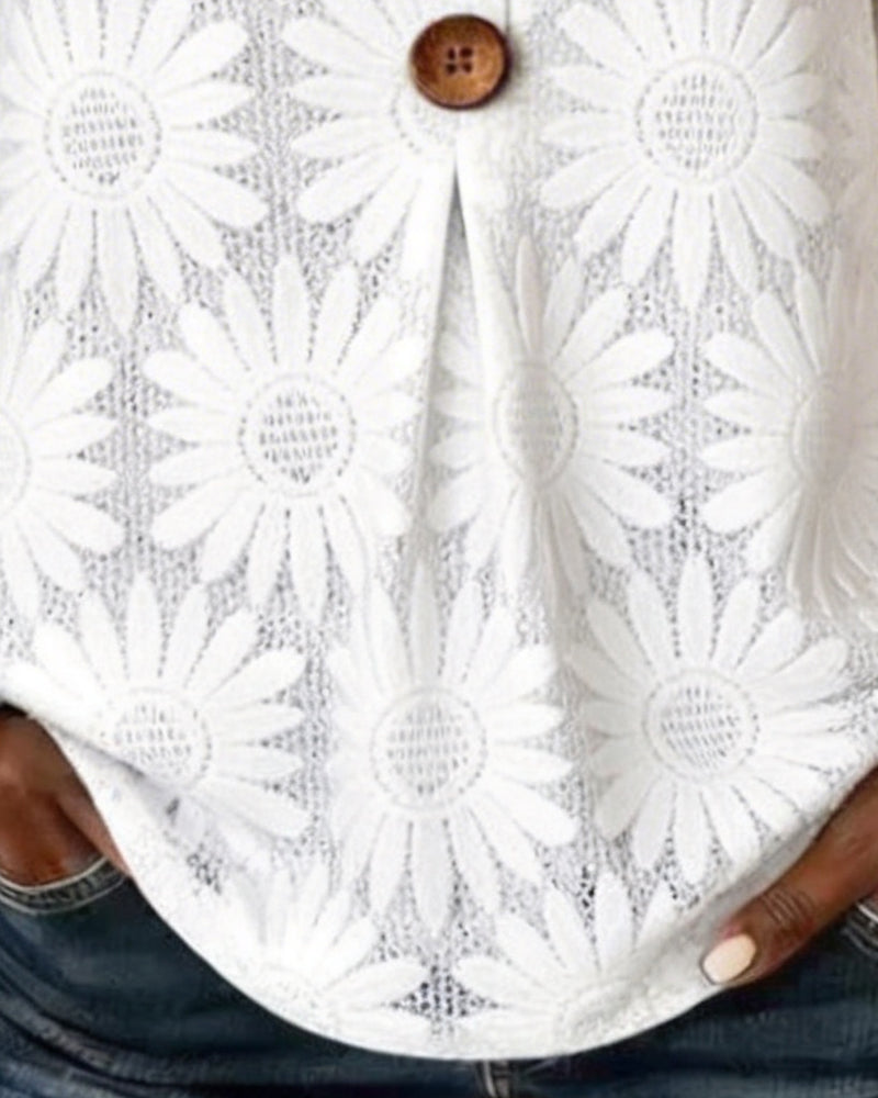 Blusa con estampado de margaritas y volantes