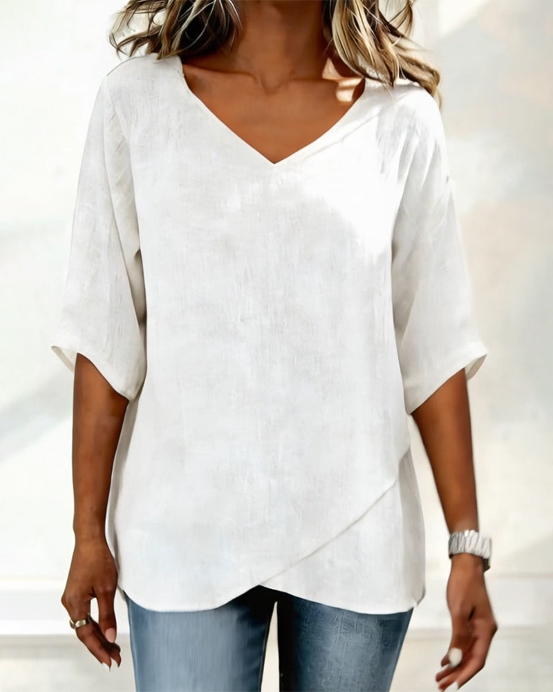 Blusa con dobladillo asimétrico y escote en v