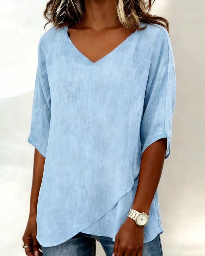 Blusa con dobladillo asimétrico y escote en v