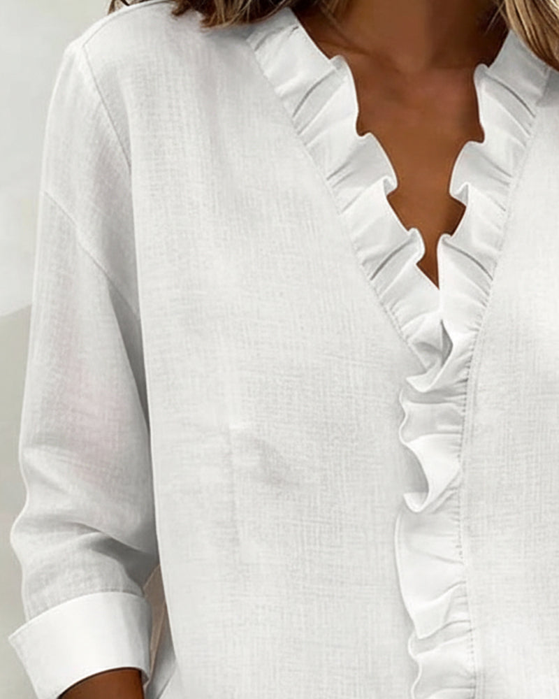Blusa fruncida con escote en v
