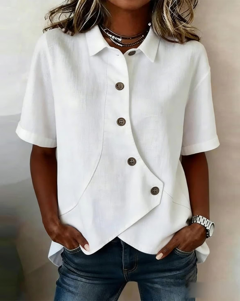 Blusa asimétrica de algodón y lino con botones